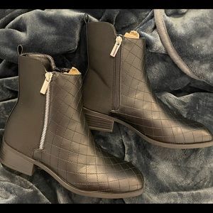 Never worn Just Fab quilted look boots